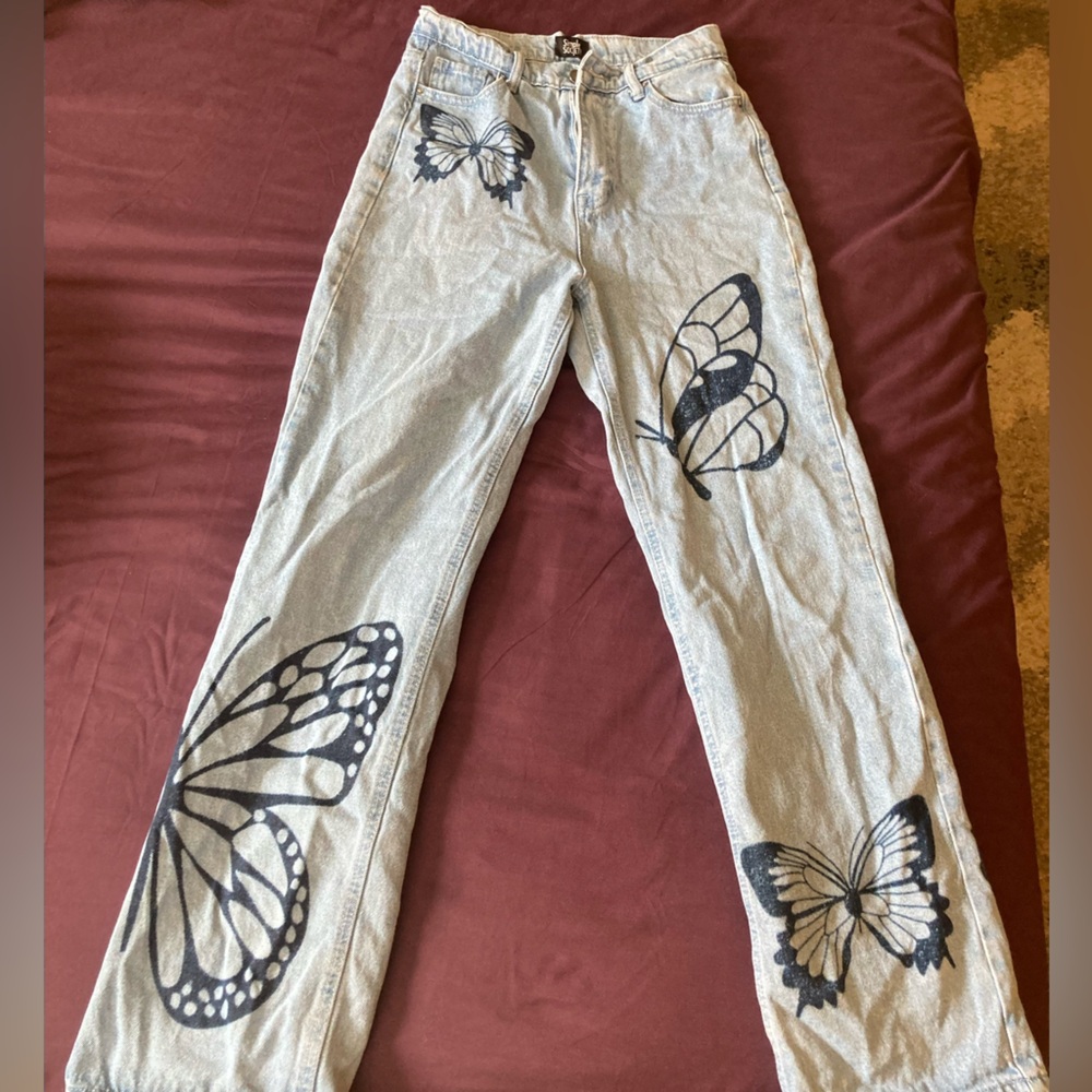 Light blue butterfly jeans